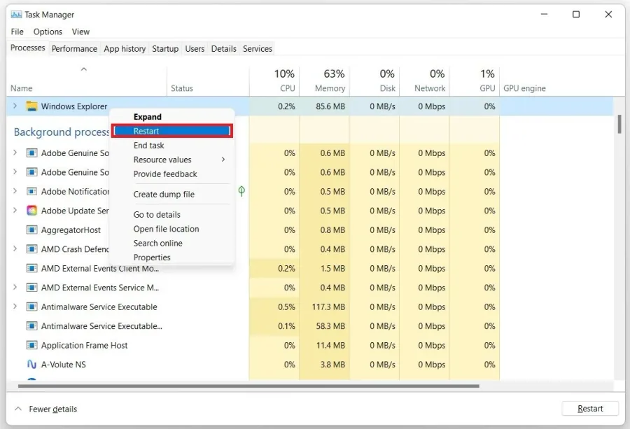 Task Manager > Processes > Windows Explorer > Restart