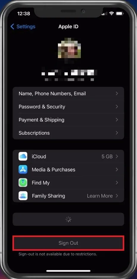 iPhone Settings > Apple ID > Sign Out