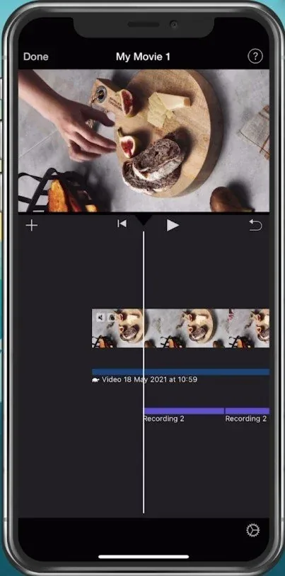 Pinch the video footage with 2 fingers and start rotating it