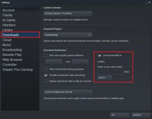 Steam Settings > Downloads > Limit Bandwidth