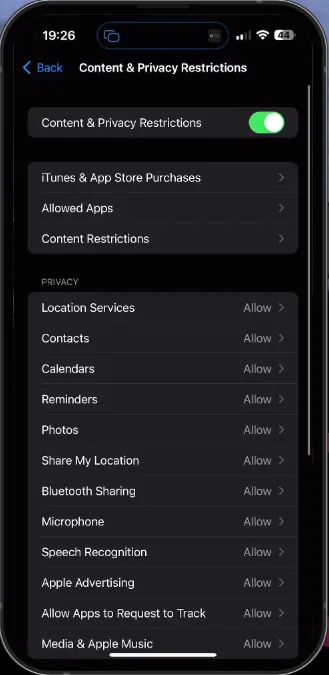 iPhone Settings > Screen Time > Content & Privacy Restrictions