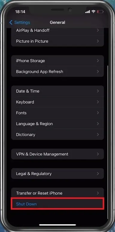 iPhone Settings > General > Shut Down