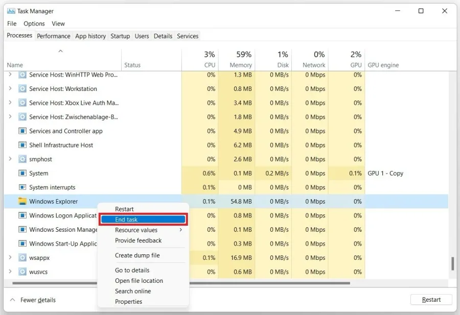 Task Manager > Processes > Windows Explorer > Restart